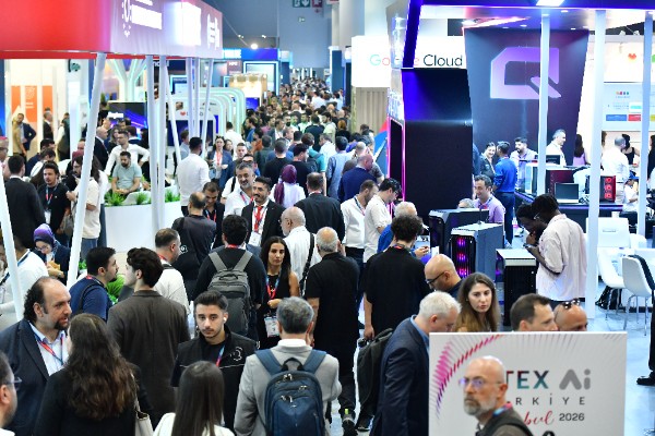 Attendees fill the aisle beside the Google Cloud stand on the opening day of GITEX Ai Türkiye at Istanbul Expo Centre
