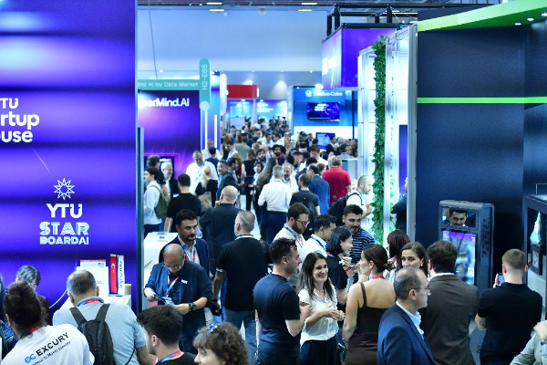 Visitors gather at the YTU Startup House and StarBoard AI stands in the startup hall at GITEX Ai Türkiye